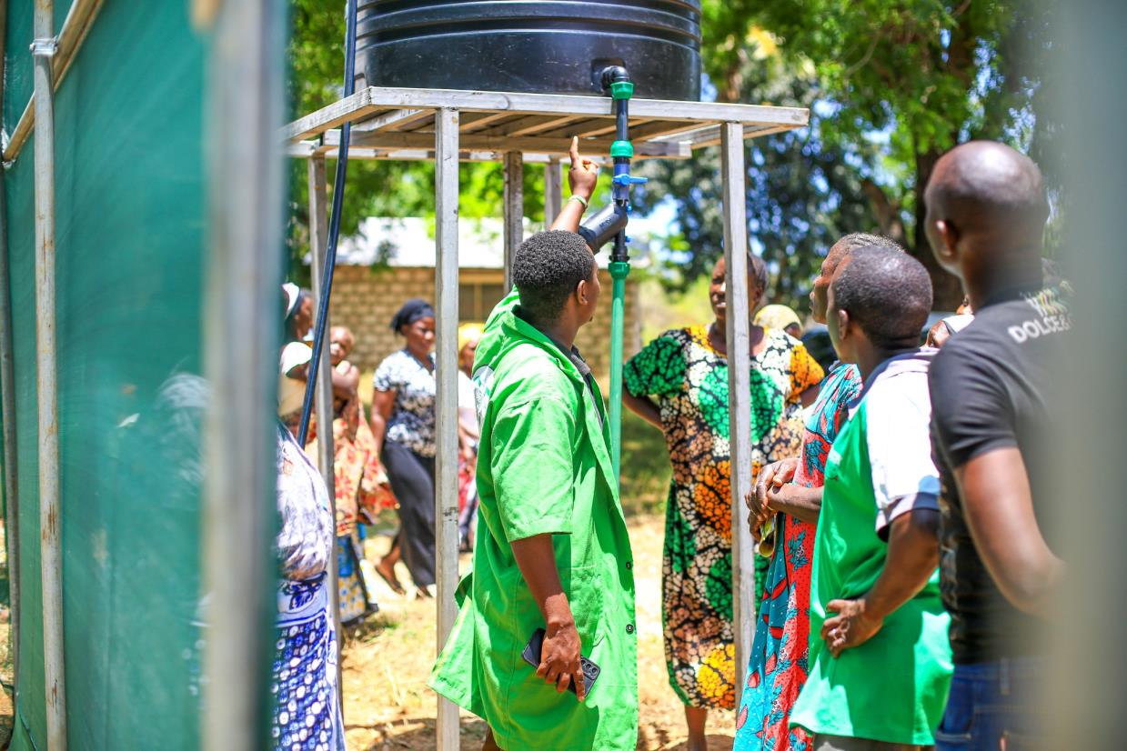 Farmer training in water storage and efficient irrigation management.